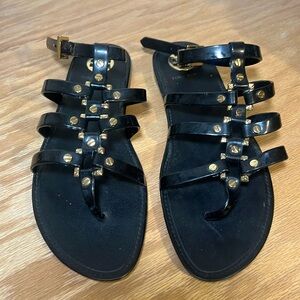 Tory Burch gladiator sandals. Black and Gold